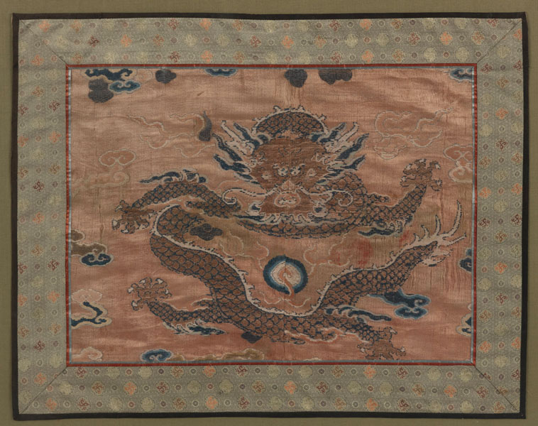 <b>A SILK ROBE FRAGMENT WITH CENTRAL DRAGON</b>