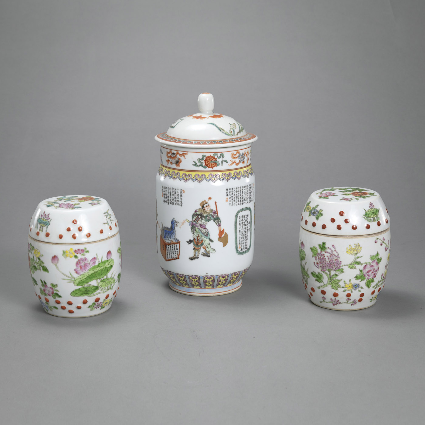 <b>THREE LIDDED 'FAMILLE ROSE' PORCELAIN VESSELS, ONE WITH 'WU SHUANG PU' FIGURES</b>