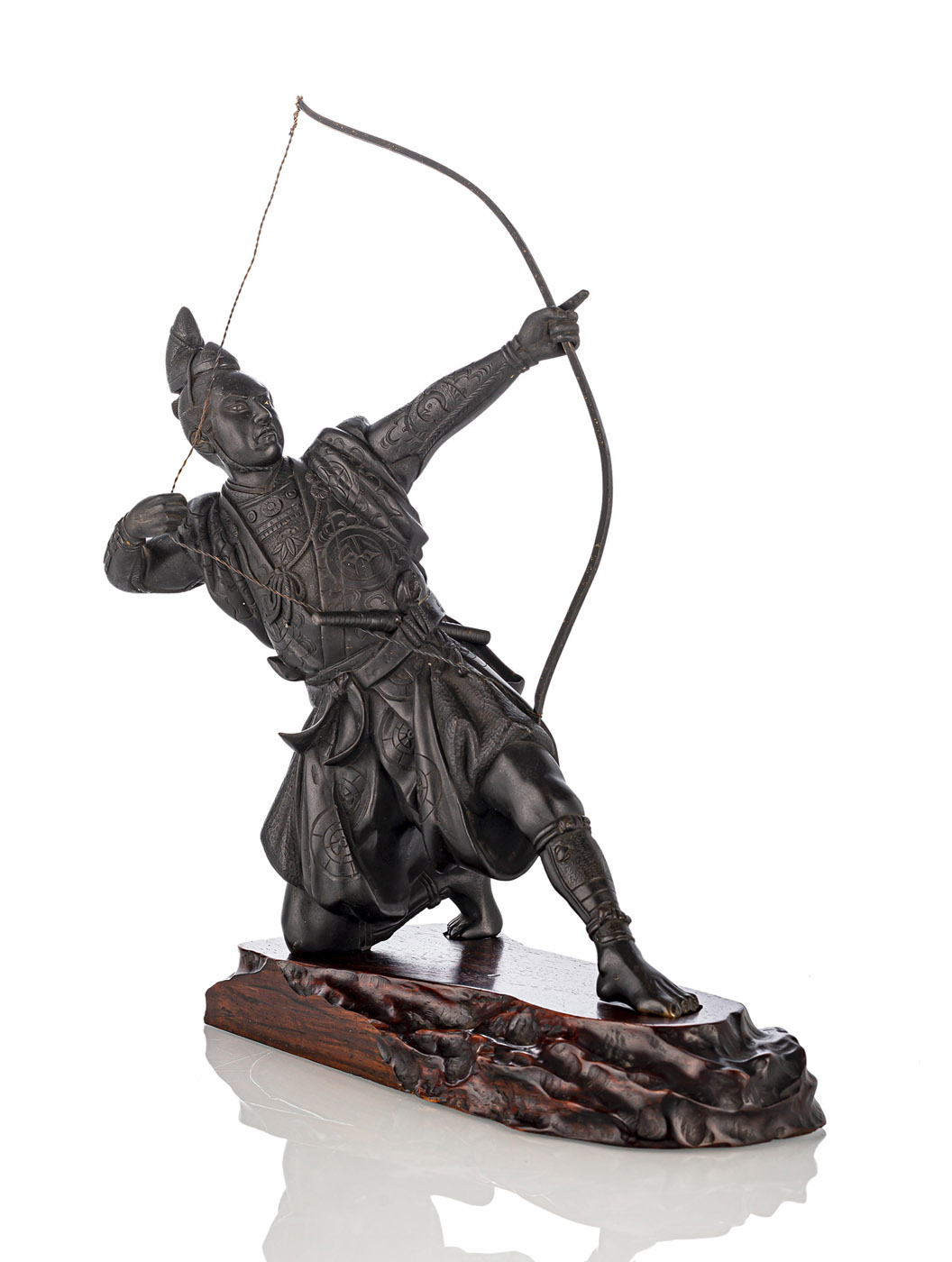 <b>A BRONZE MODEL OF A KNEELING ARCHER ON CARVED WOOD STAND</b>