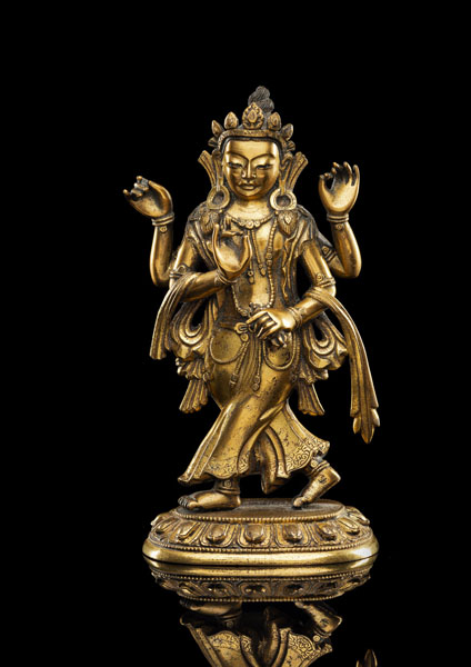 <b>Seltene feuervergoldete Bronze einer vierarmigen Opfergöttin</b>