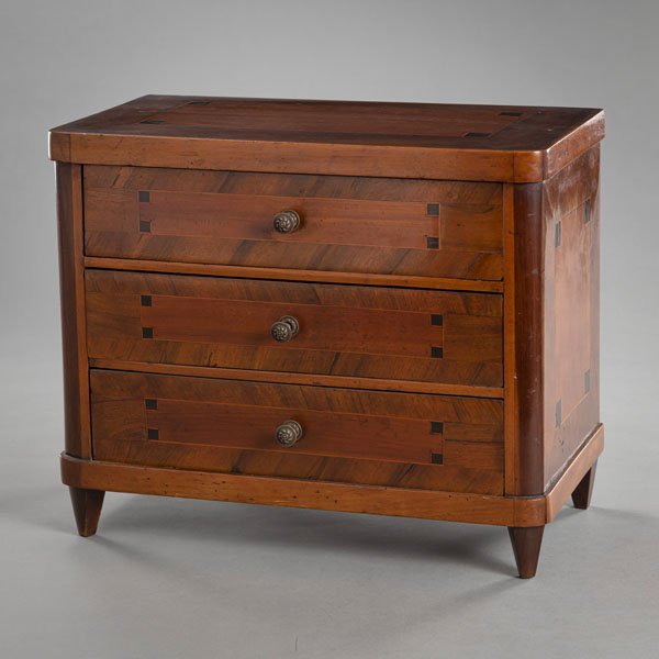 <b>A BIEDERMEIER WALNUT AND SHERRYWOOD MODEL COMMODE</b>