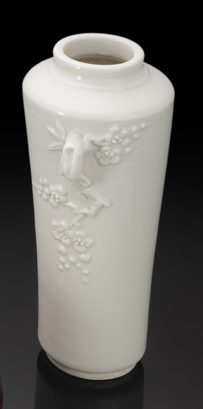 <b>A DEHUA VASE WITH MOLDED PRUNUS BRANCHES AS HANDLES</b>