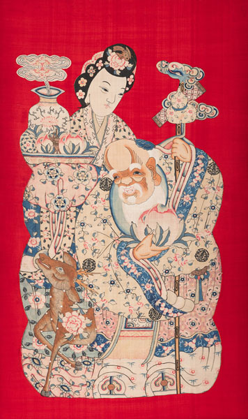 <b>A LARGE SILK 'KESI' HANGING DEPICTING SHOULAO AND MAGU ON A RED BACKGROUND, PARTLY PAINTED IN INK AND COLORS</b>