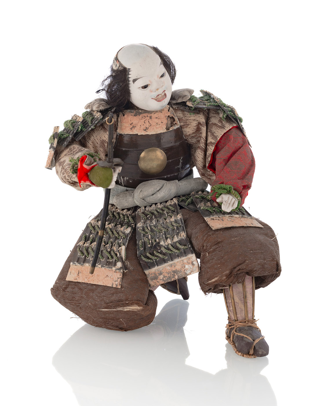 <b>A SAMURAI PUPPET HOLDING A SWORD</b>