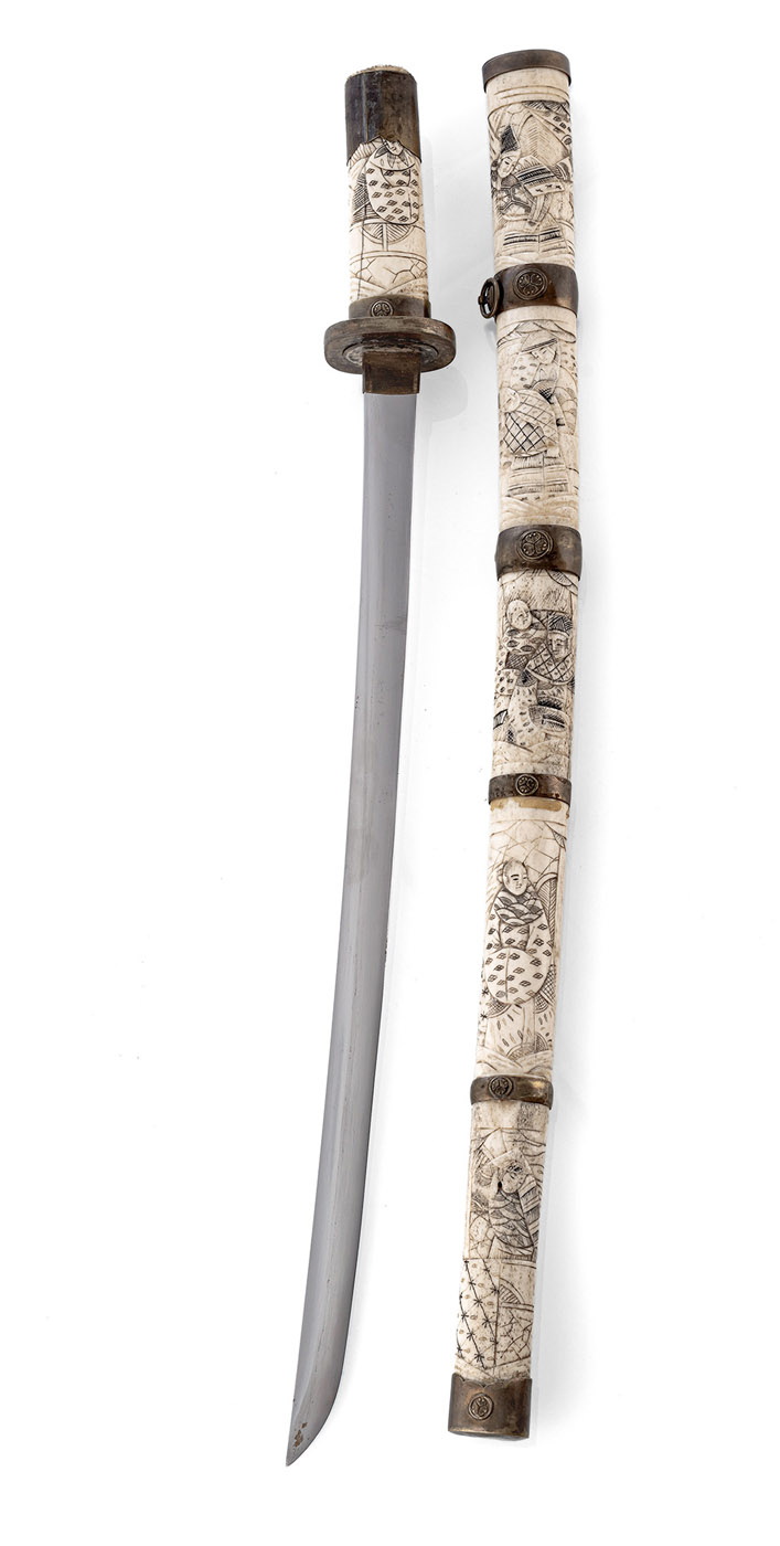 <b>A SWORD WITH CARVED BORN MOUNTING</b>