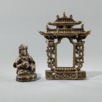 <b>A BRONZE FIGURE OF VAISHRAVANA AND A METAL RELIEF</b>