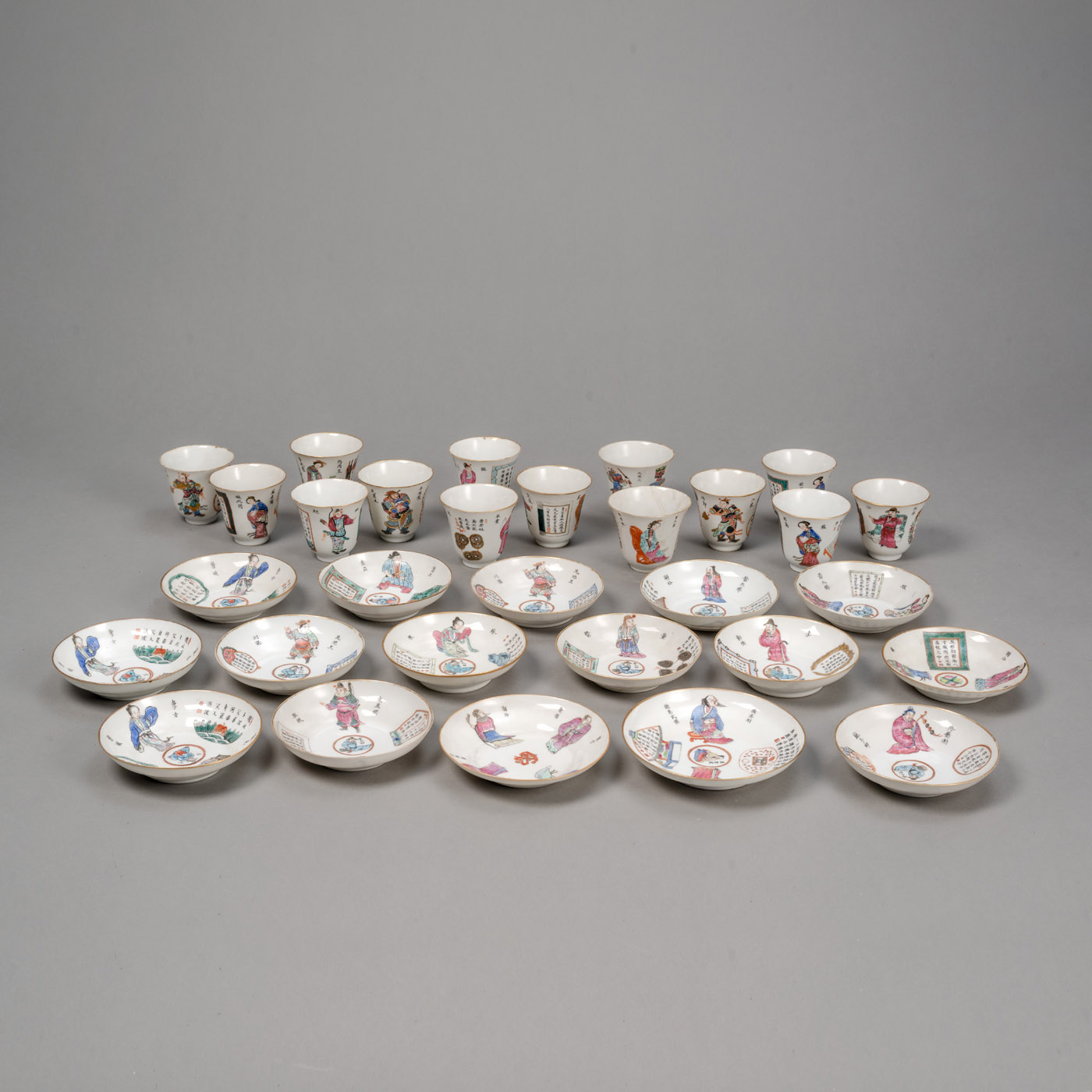 <b>A SET OF 14 'FAMILLE ROSE' 'WU SHUANG PU' TEA CUPS AND 16 SAUCERS</b>