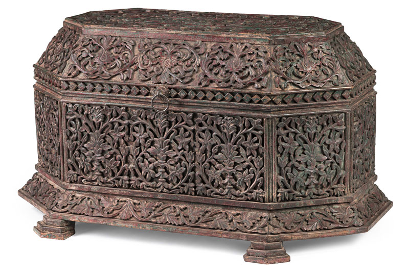 <b>A RELIEF CARVED OCTAGONAL LIDDED WOODEN CHEST</b>