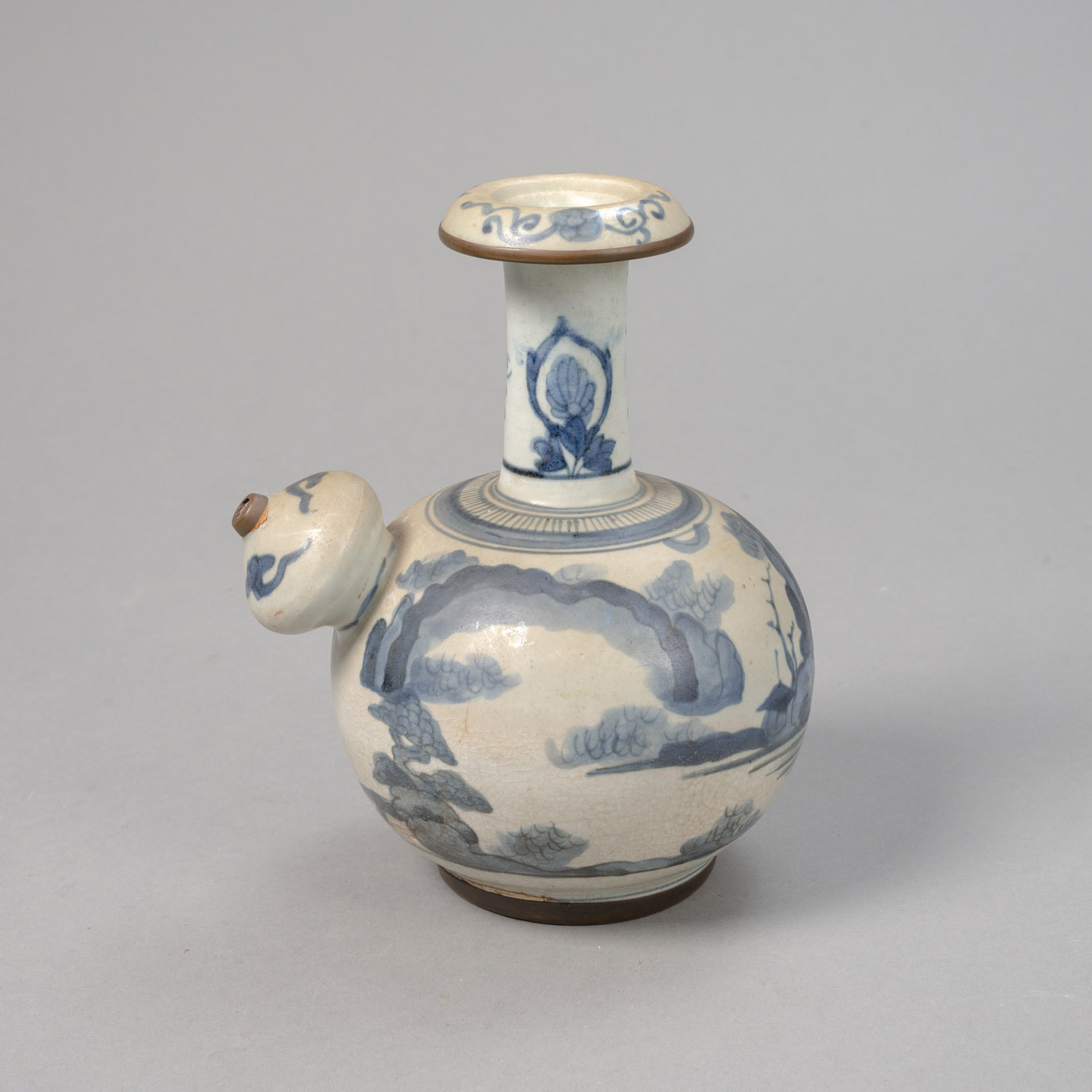 <b>A UNDERGLAZE BLUE PORCELAIN KENDI WITH A LANDSCAPE</b>