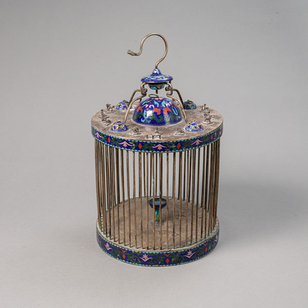 <b>A SILVERED ENAMEL-DECORATED BIRD CAGE</b>