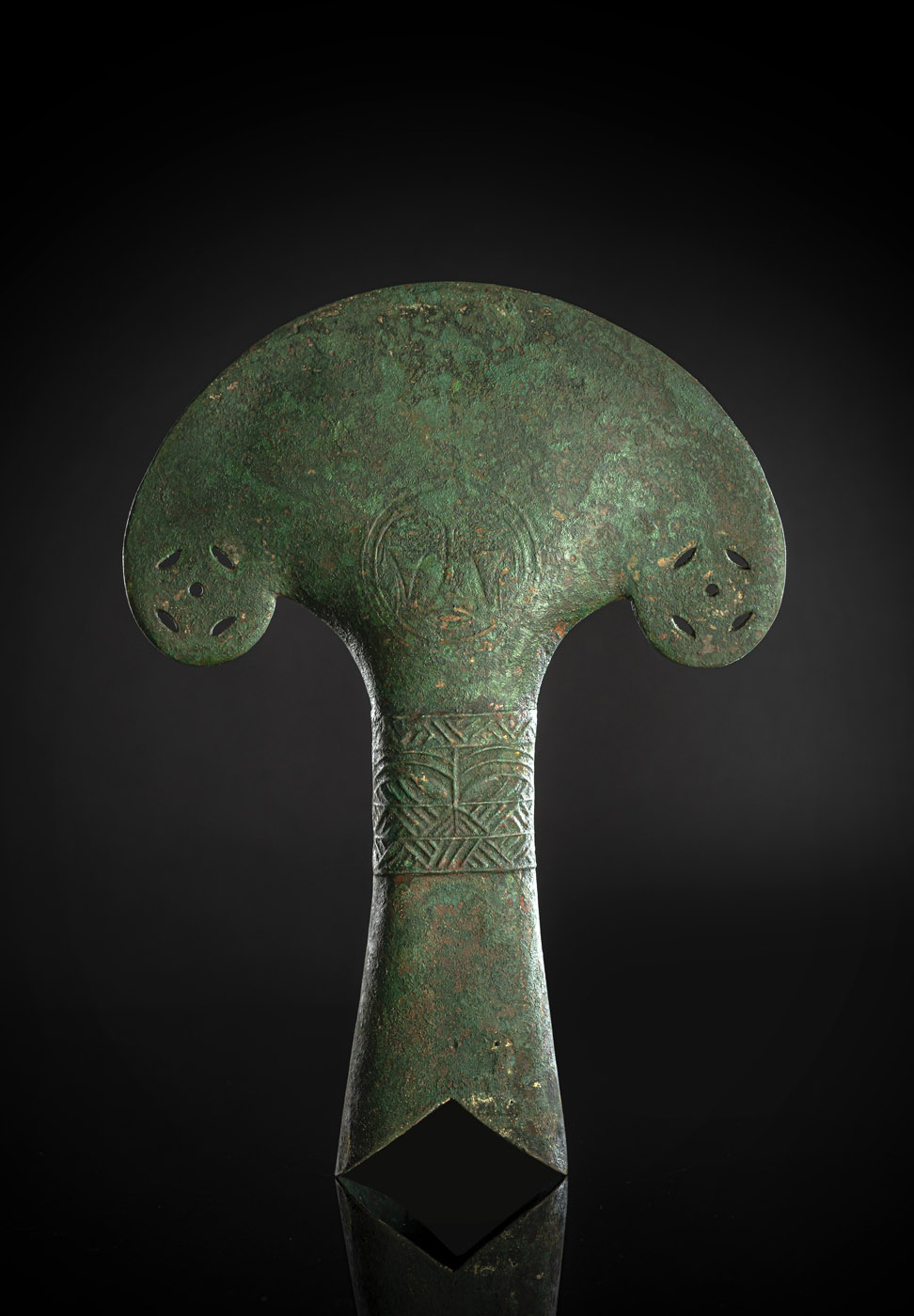 <b>A RARE YUNNANESE BRONZE CEREMONIAL AXE</b>