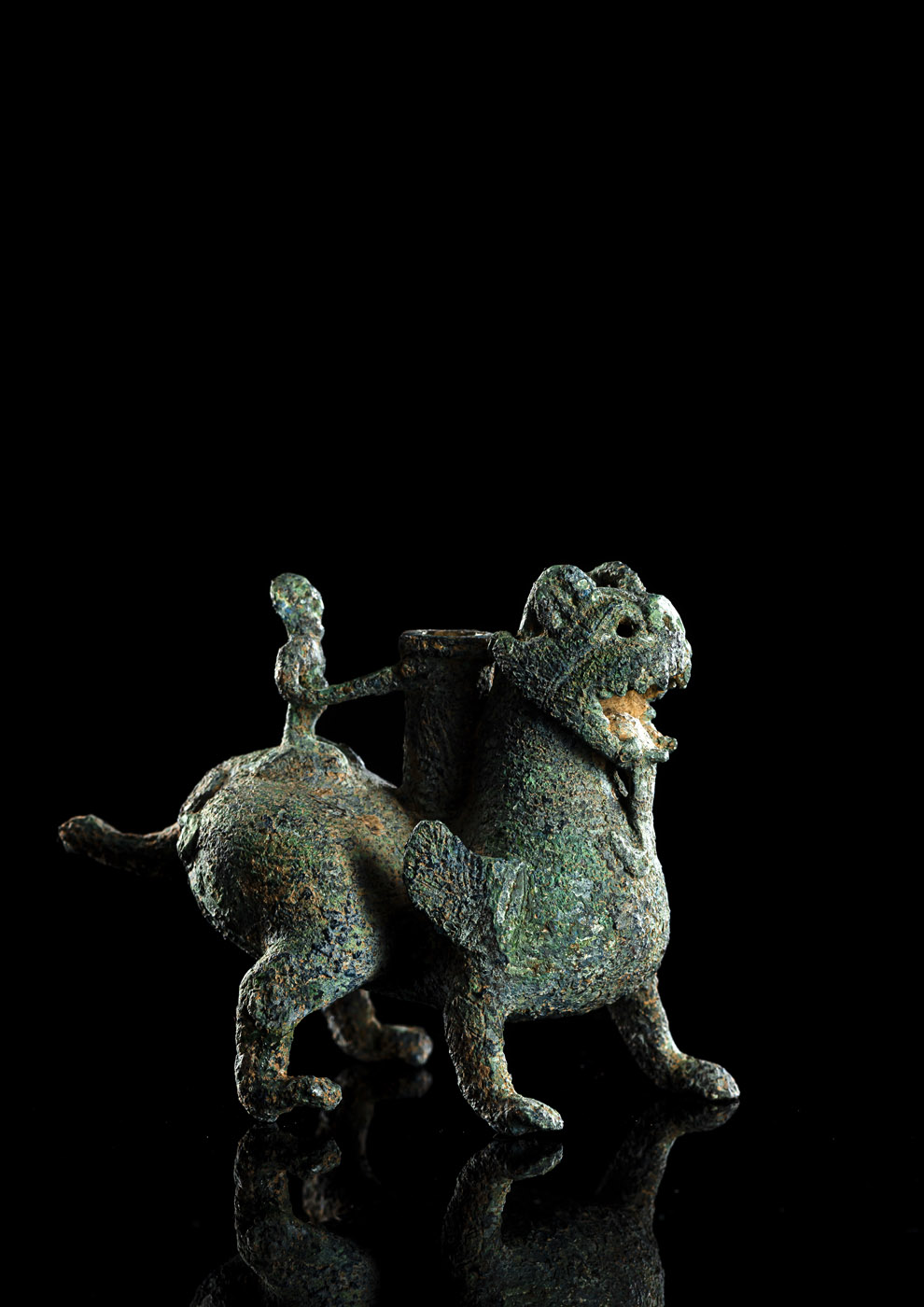 <b>A SMALL RARE BRONZE CHIMERA-FORM VESSEL</b>