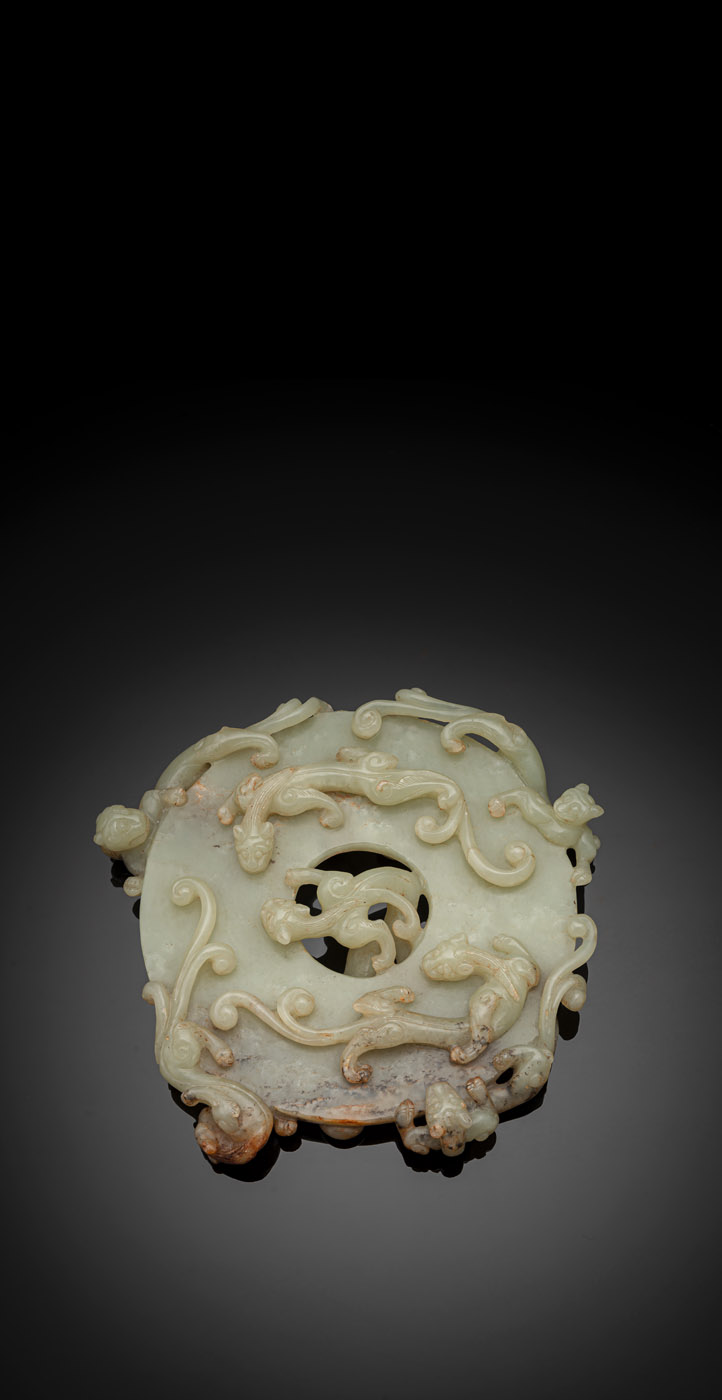 <b>A FINE YELLOW AND GREEN JADE BI WITH NINE CHILONG</b>