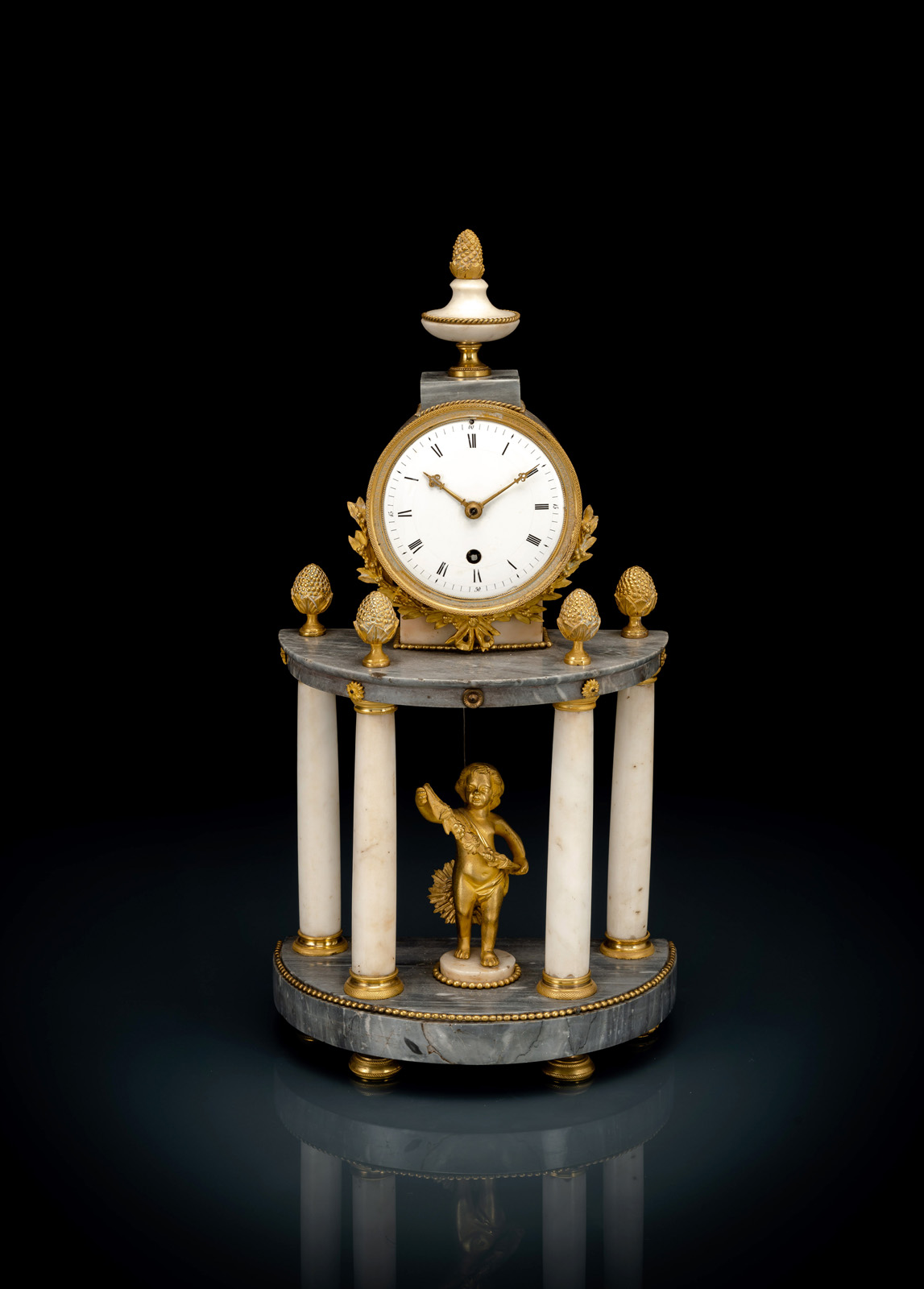 <b>A FRENCH ORMOLU MOUNTED MARBLE TEMPLE FORMED PENDULE</b>