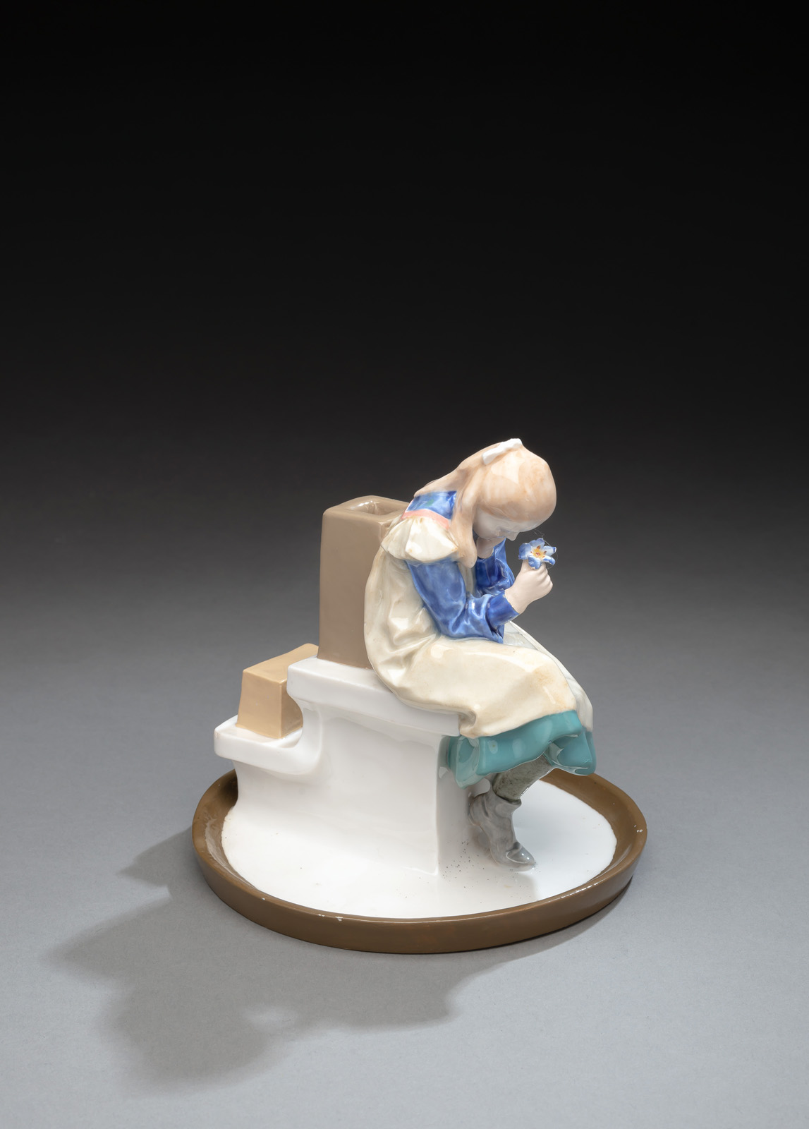 <b>A MEISSEN GIRL WITH A FLOWER (GIRL WITH BOOK)</b>