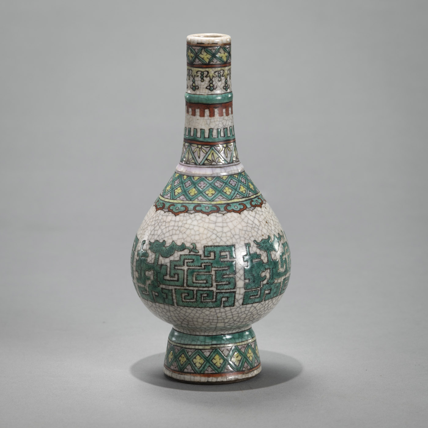 <b>A POLYCHROME PORCELAIN CRAZED-GROUND BOTTLE VASE</b>