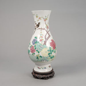 <b>A 'FAMILLE ROSE' PORCELAIN VASE SHOWING BIRDS, BUTTERFLIES, AND FLOWERS</b>