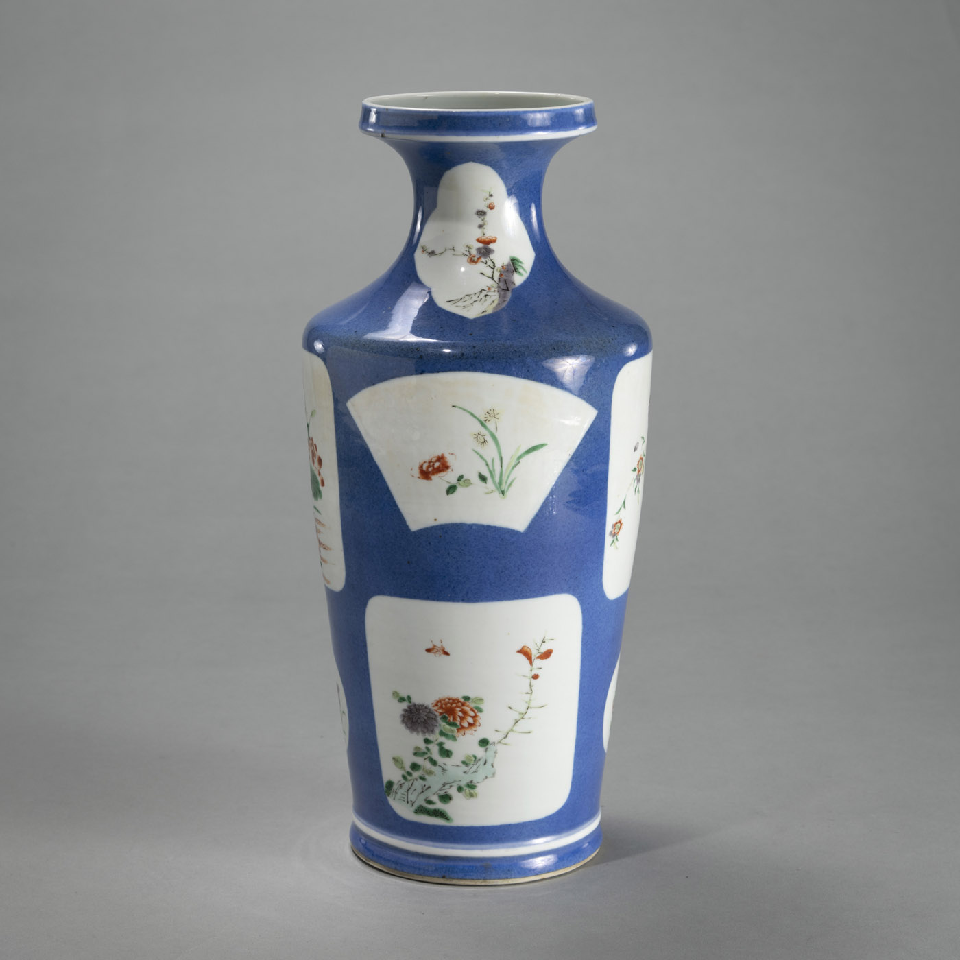 <b>A POWEDER BLUE PORCELAIN VASE WITH 'FAMILLE VERTE' FLORAL DECORATION IN RESERVES</b>