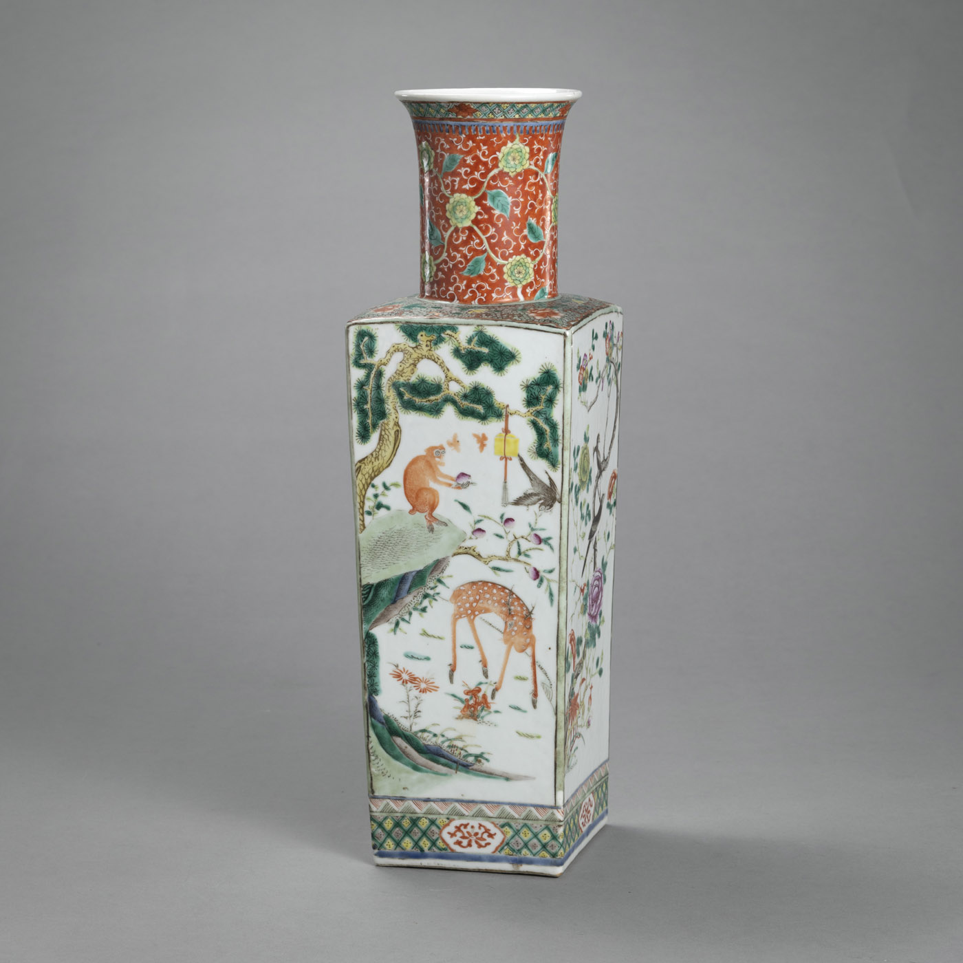 <b>A 'FAMILLE VERTE' SQUARE VASE WITH A CYLINDRICAL NECK DECORATED WITH FLOWERS AND BIRDS</b>