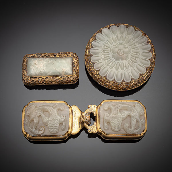 <b>A GROUP OF THREE FINE GILT-BRONZE AND JADE-INLAID BELT BUCKLES</b>