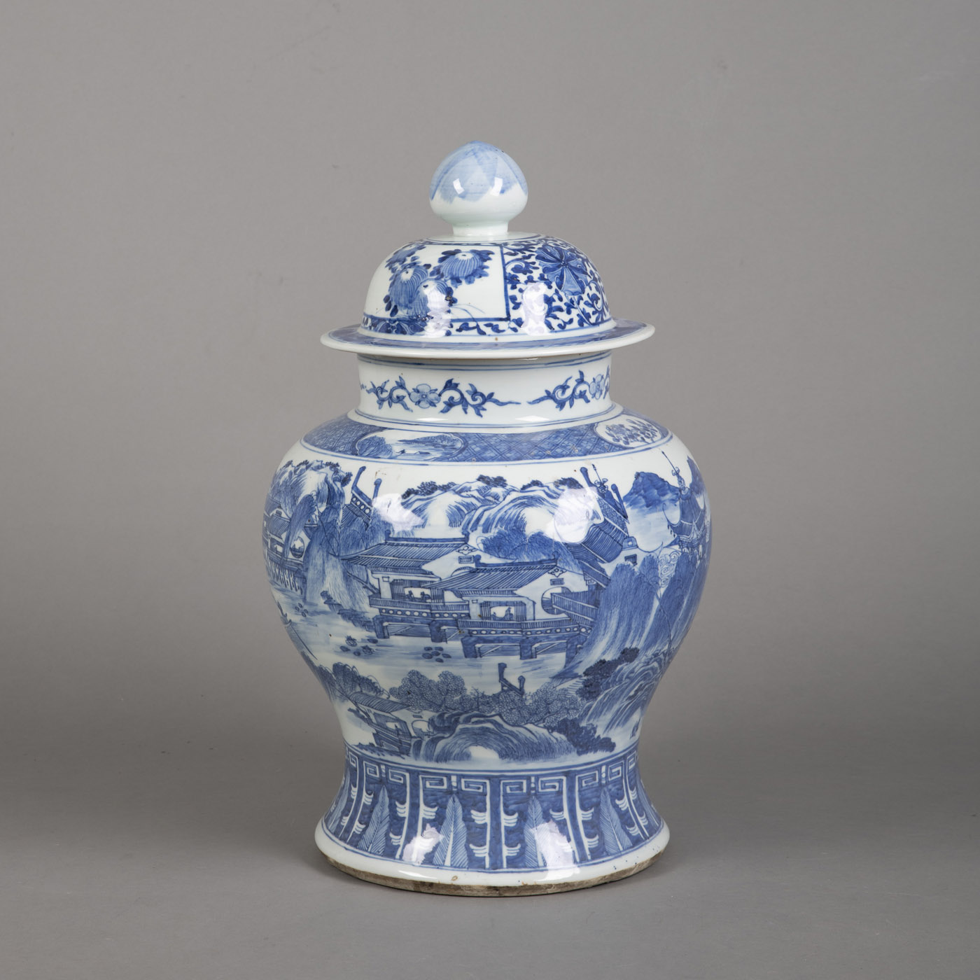 <b>A BLUE AND WHITE PORCELAIN LANDSCAPE VASE AND COVER</b>