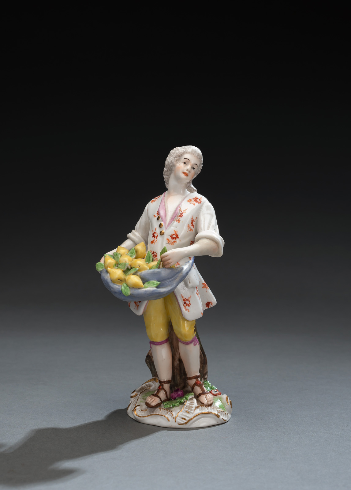 <b>A FIGURINE OF A LEMON DEALER</b>