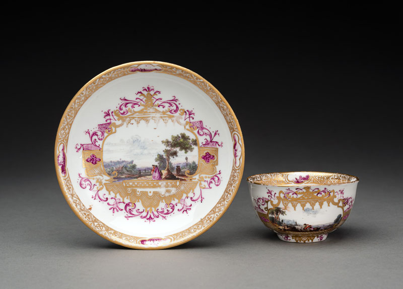 <b>A MEISSEN KAUFFAHRTEI AND LANDSCAPE PATTERN AND GILT CUP AND SAUCER</b>