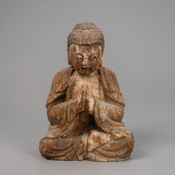<b>Figur des Buddha aus Holz mit Resten von Fassung</b>