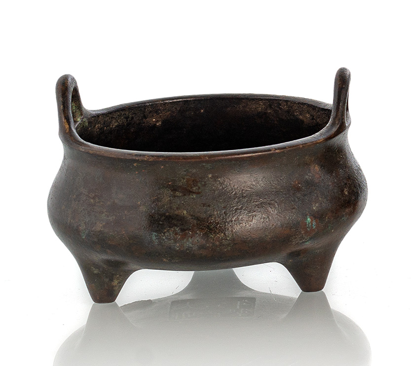 <b>A BRONZE TRIPOD CENSER</b>