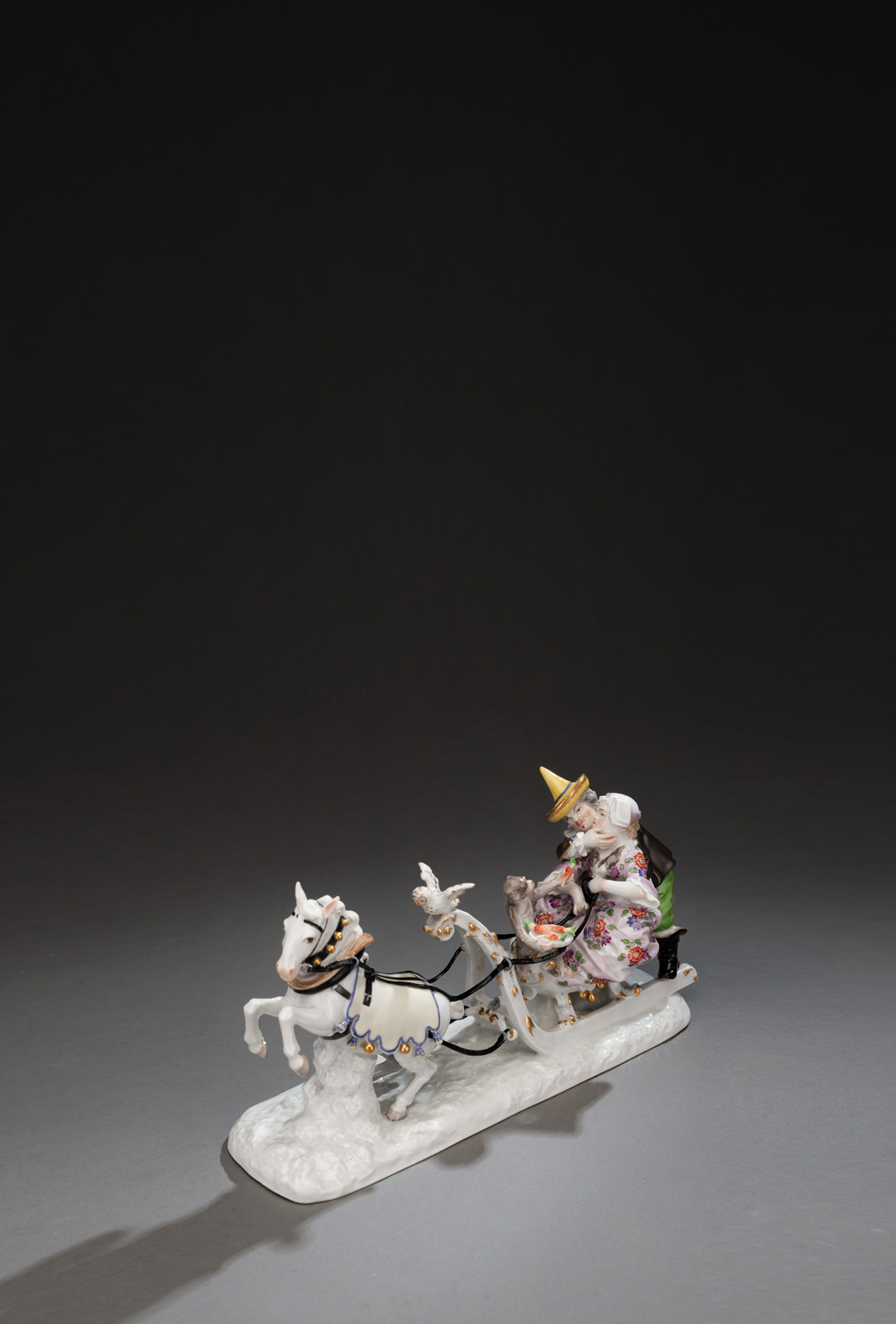 <b>A MEISSEN SLED CARRY WITH COURT JESTER 