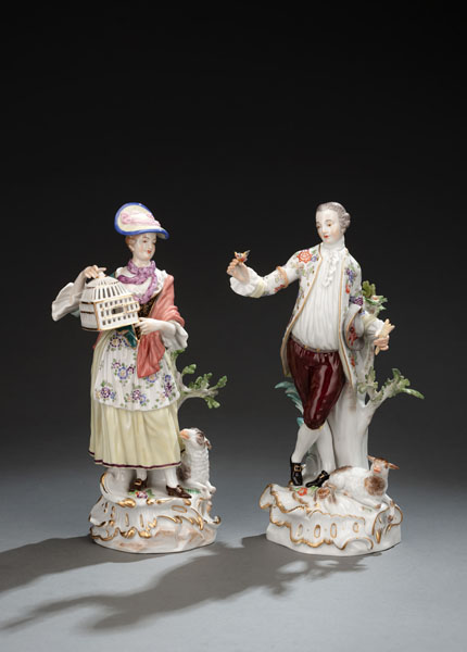 <b>A MEISSEN PAIR OF SHEPHERDERS WITH CAGE AND BIRD</b>