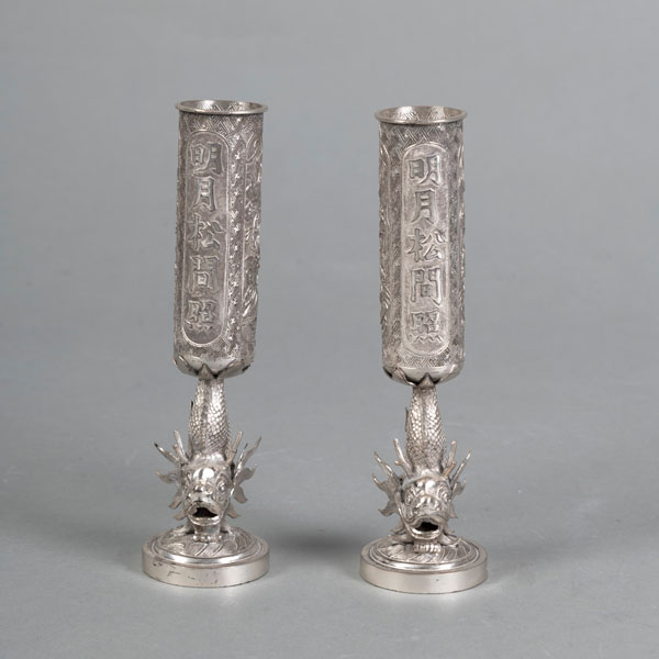 <b>A PAIR OF SILVER CANDLESTICKS WITH DRAGON DECORATION AND POEM INSCRIPTIONS</b>