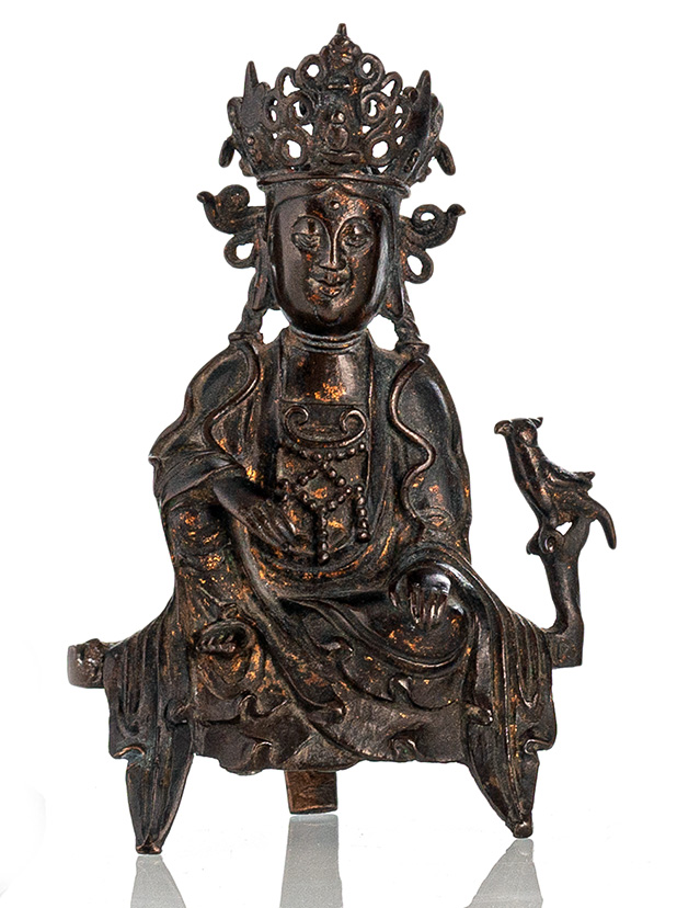 <b>A BRONZE FIGURE OF GUANYIN SEATED ON A PEDESTAL WITH A BIRD</b>