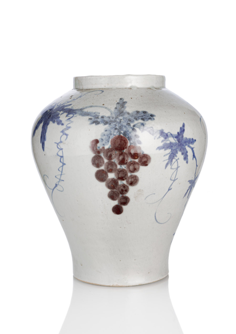 <b>A RARE BLUE AND WHITE AND COPPER-RED DECORATED GRAPE AND WINE JAR</b>