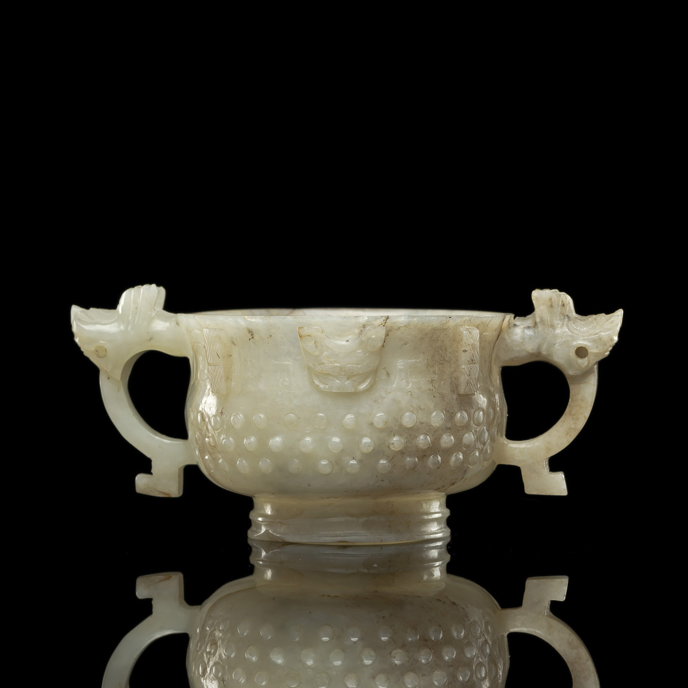 <b>A WELL CARVED JADE 'GUI' IN ARCHAIC STYLE</b>