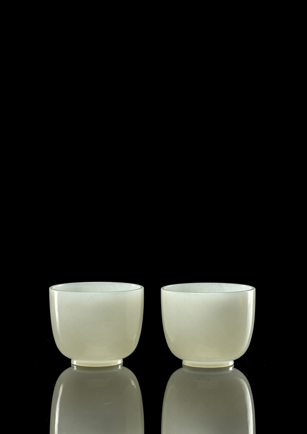<b>AN EXCEPTIONAL PAIR OF  WHITE JADE BOWLS</b>
