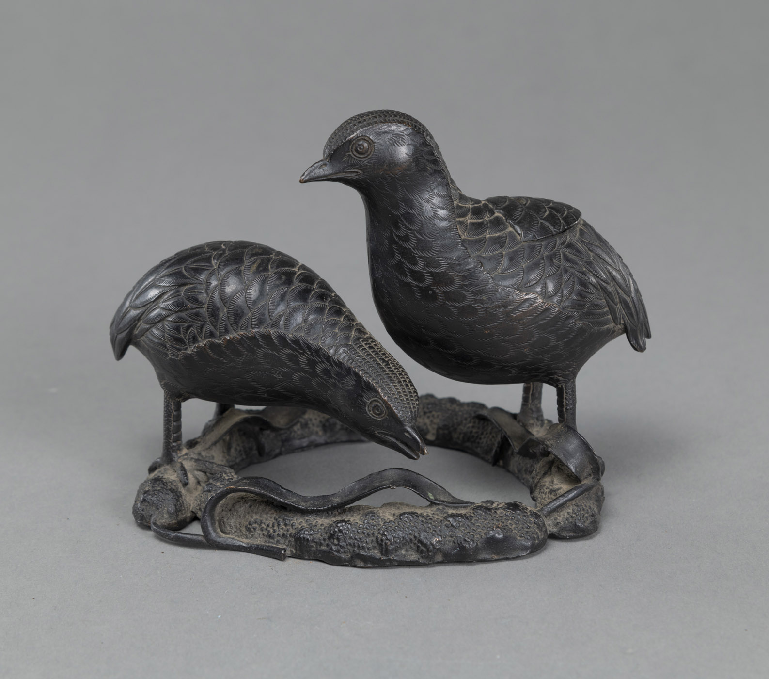 <b>A BRONZE OKIMONO OF TWO QUAILS</b>