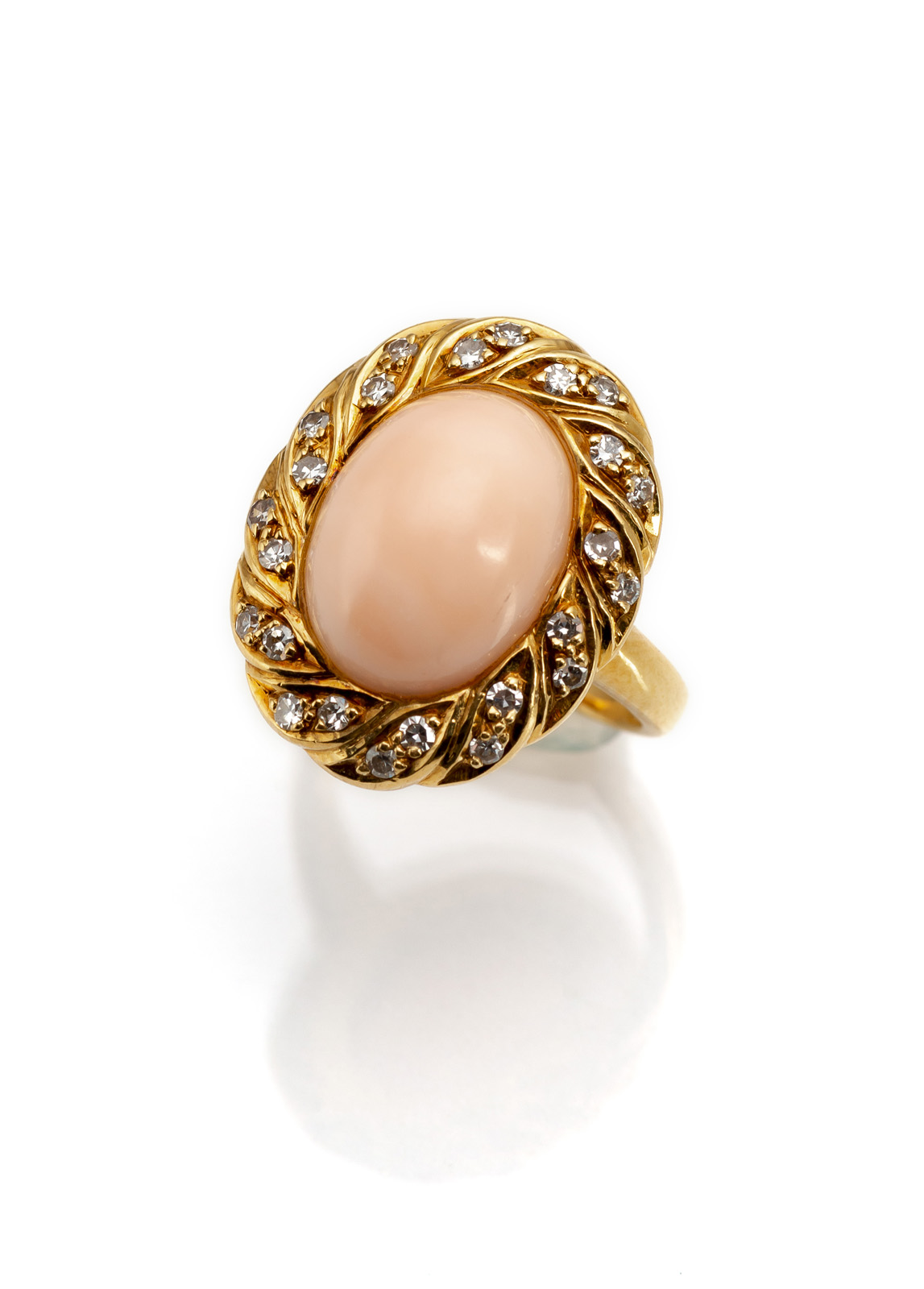 <b>A CORAL AND DIAMOND RING</b>