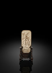 <b>A FINE CARVED IVORY PANEL WITH GILT MOUNTS, MOUNTED AS SMALL TABLE SCREEN WITH WOOD STAND</b>