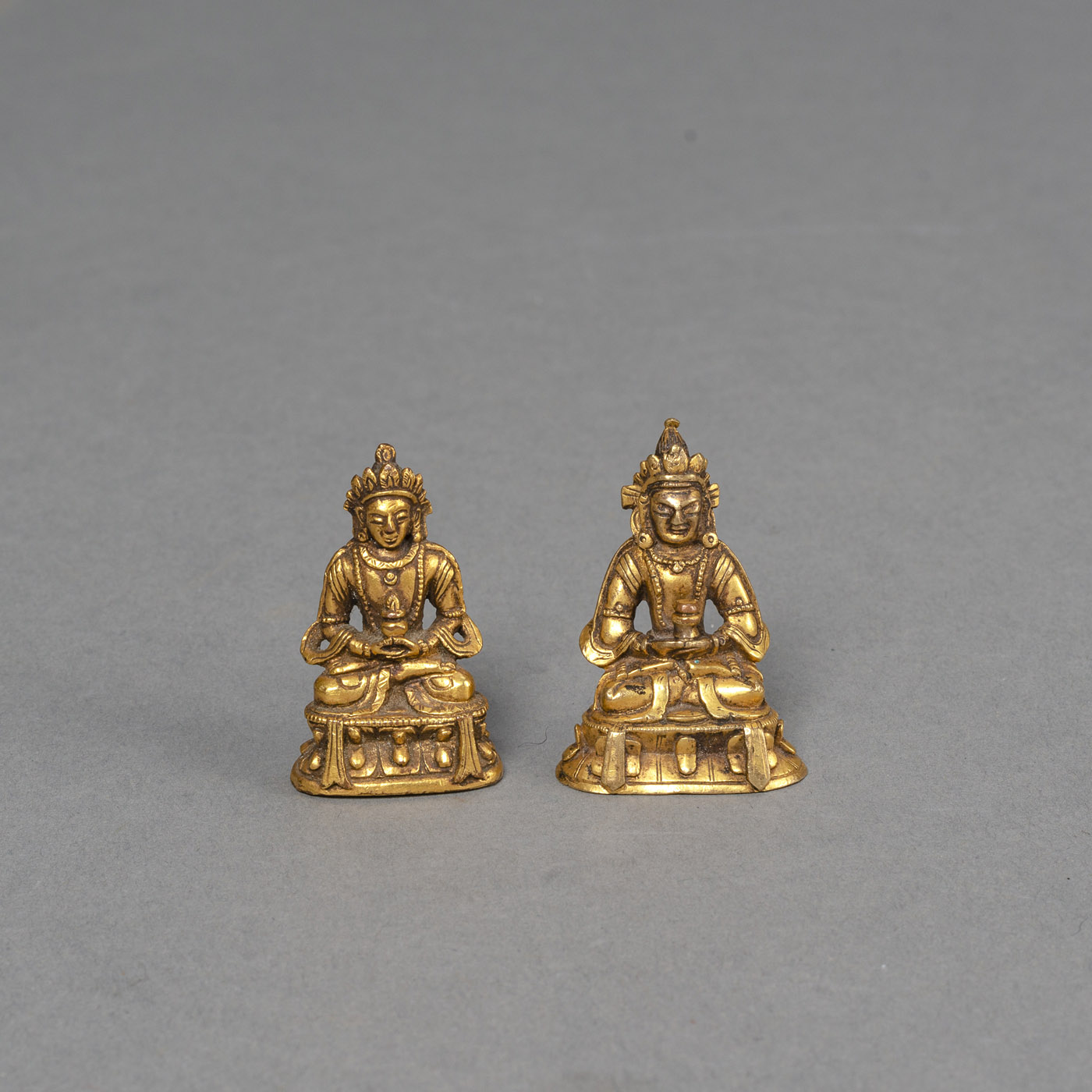 <b>TWO MINIATURE GILT-BRONZE FIGURES OF AMITAYUS</b>