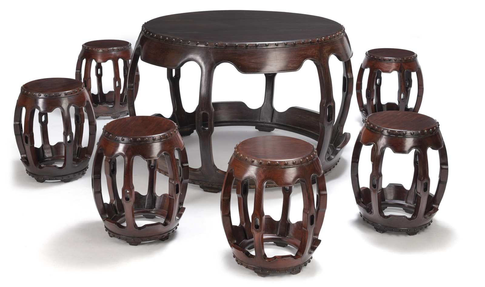 <b>A SET OF SIX DRUM-SHAPED STOOLS AND A TABLE</b>