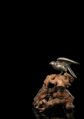 <b>A FINE MODEL OF A SILVERED EAGLE ON A ROOTWOOD STAND</b>
