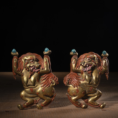 <b>A PAIR OF EMBOSSED GILT-COPPER PLAQUES</b>