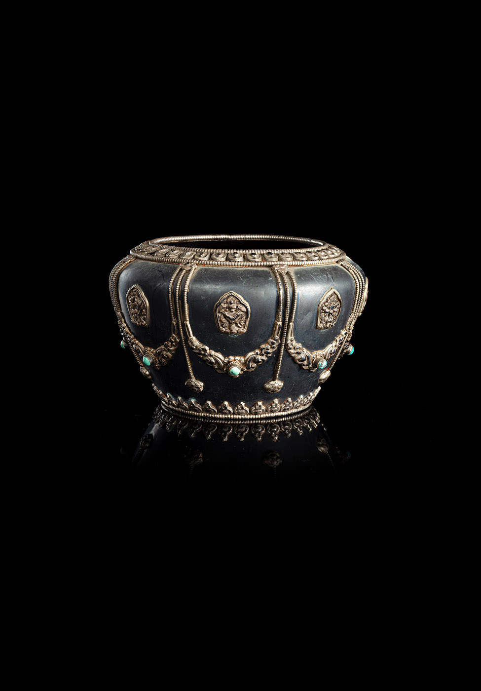 <b>A COPPER AND SILVER ALMS BOWL</b>