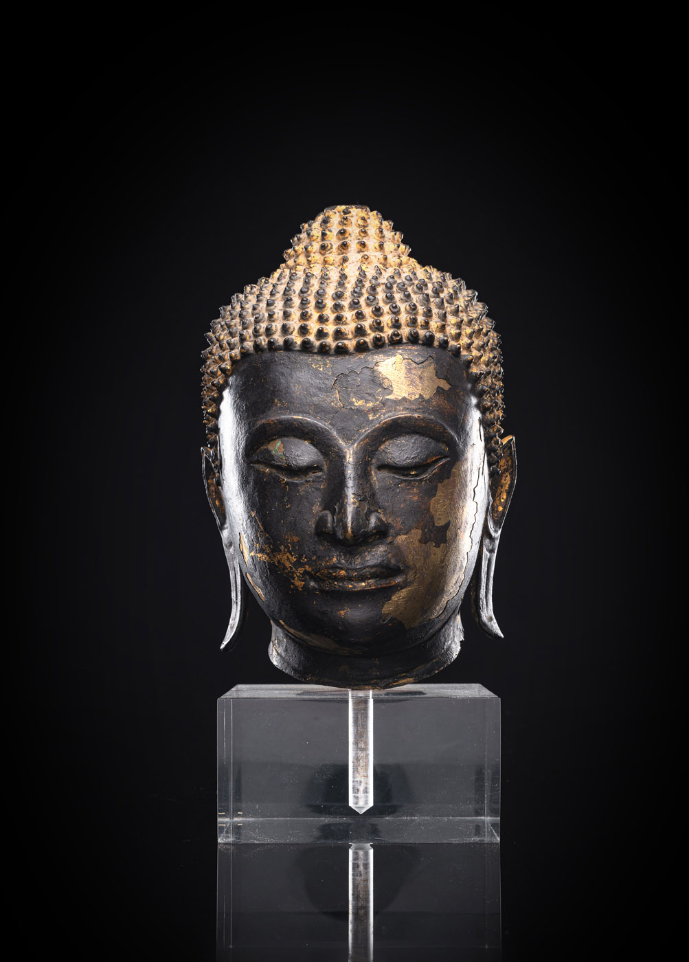 <b>A BRONZE HEAD OF BUDDHA SHAKYAMUNI</b>
