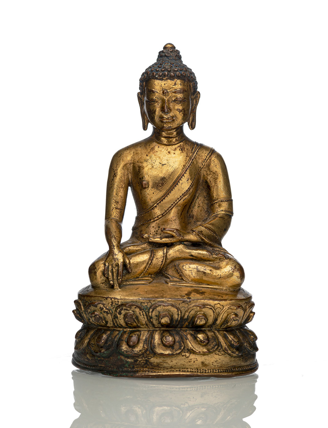 <b>A GILT-BRONZE FIGURE OF BUDDHA SHAKYAMUNI</b>