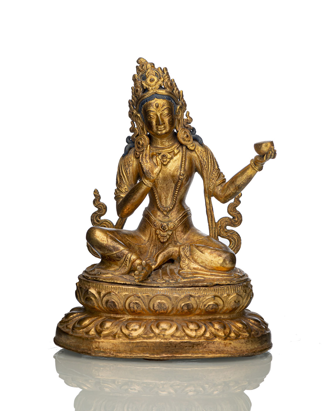 <b>A GILT-BRONZE FIGURE OF PROBABLY MANDARAVA</b>