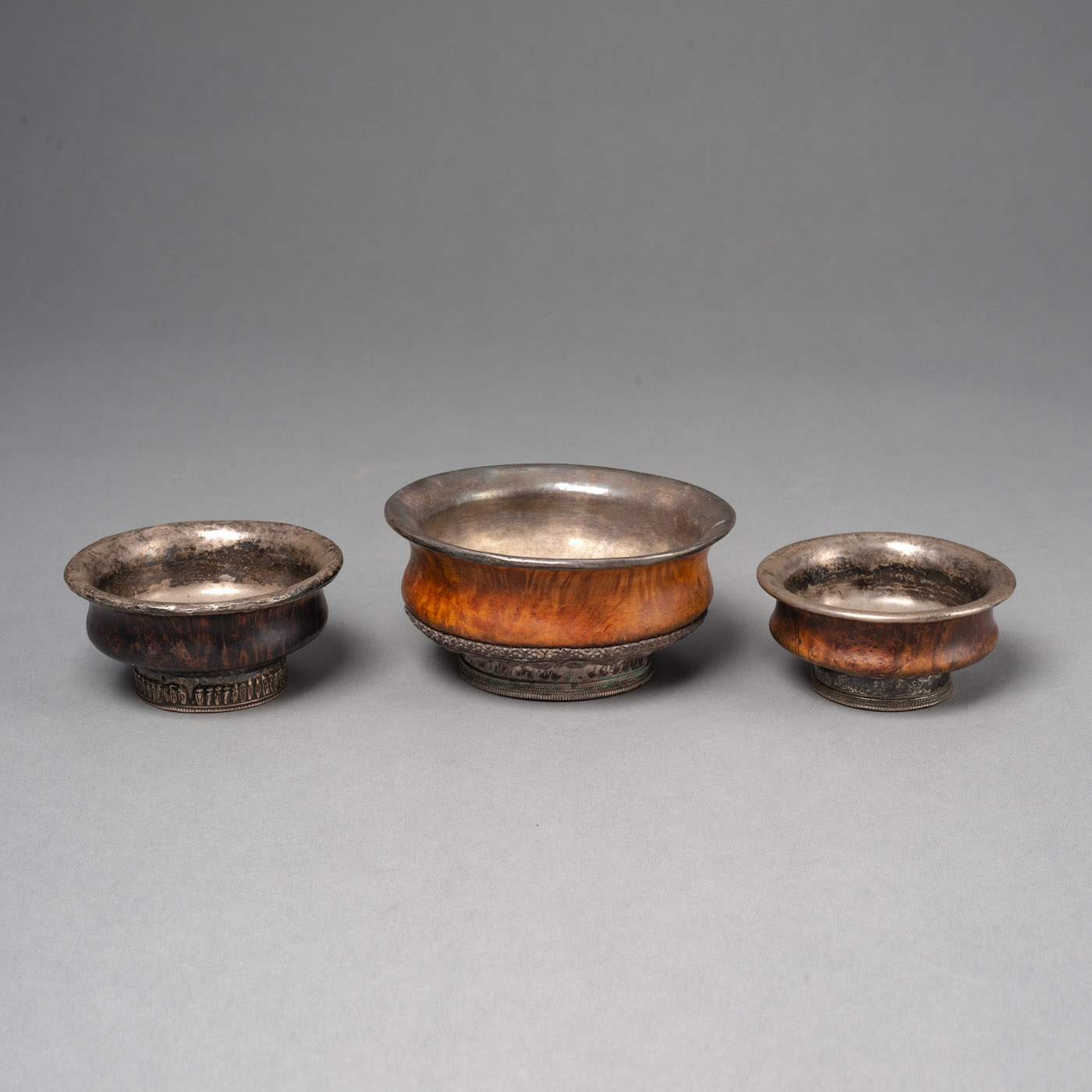 <b>THREE METAL-FITTED TEA BOWLS</b>