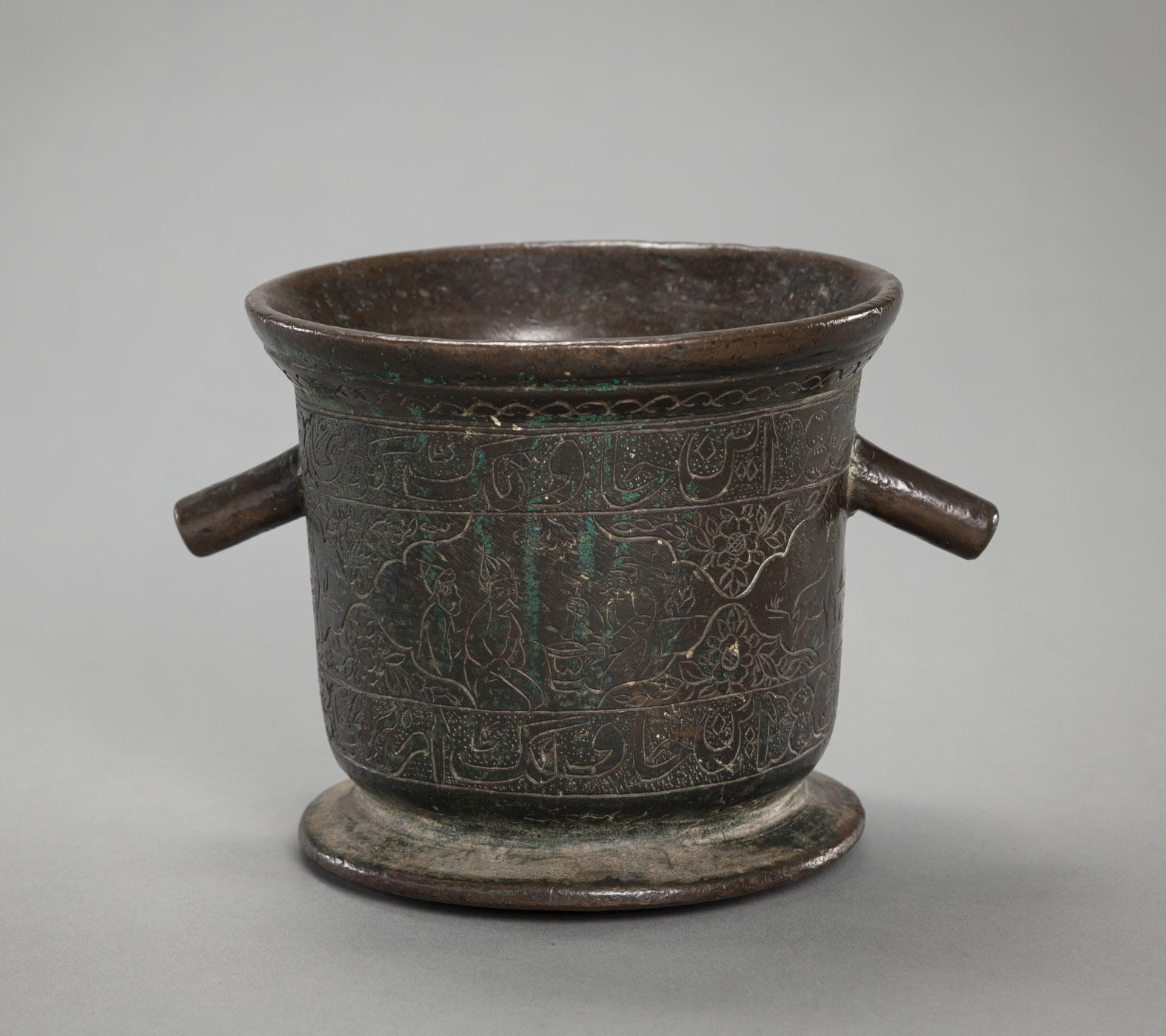 <b>A TWIN-HANDLED ENGRAVED AND INSCRIBED BRONZE MORTAR</b>