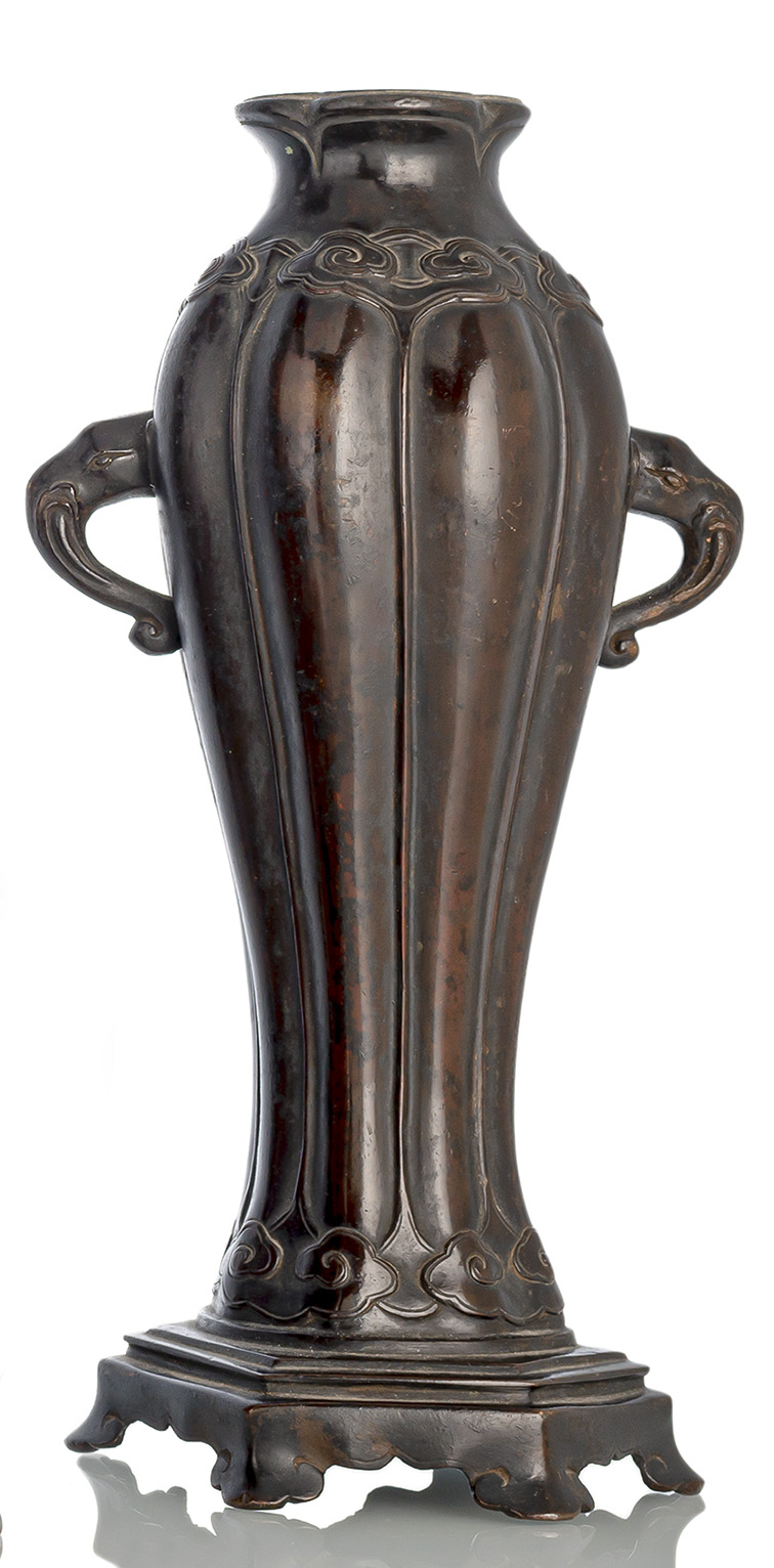 <b>A LOBED BRONZE VASE ON STAND</b>